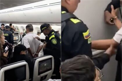 Momentul surprinzator in care un barbat este retinut de politisti in avion dupa ce a fost vazut facand un gest inacceptabil Incidentul a fost filmat de un martor